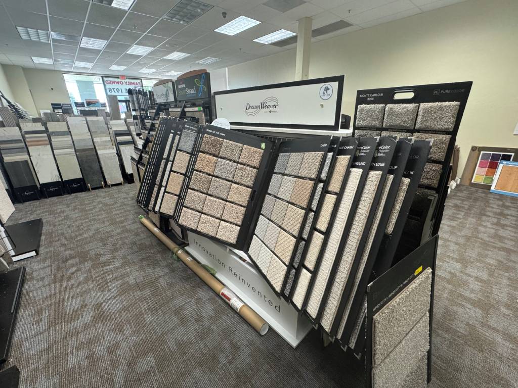Carpet flooring display at The Flooring Store & More Tucson featuring textures and colors for warm, comfortable interiors